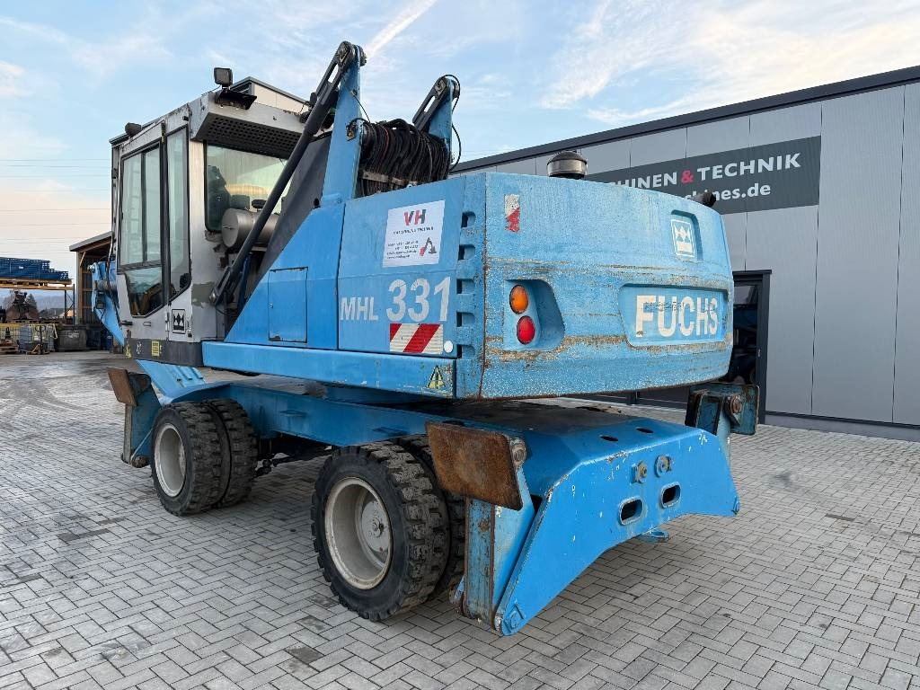 Fuchs MHL 331 - حفارة النقل والشحن: صور 3 Fuchs MHL 331 - حفارة النقل والشحن: صور 3