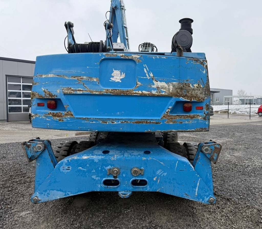 Fuchs MHL 331 - حفارة النقل والشحن: صور 4 Fuchs MHL 331 - حفارة النقل والشحن: صور 4
