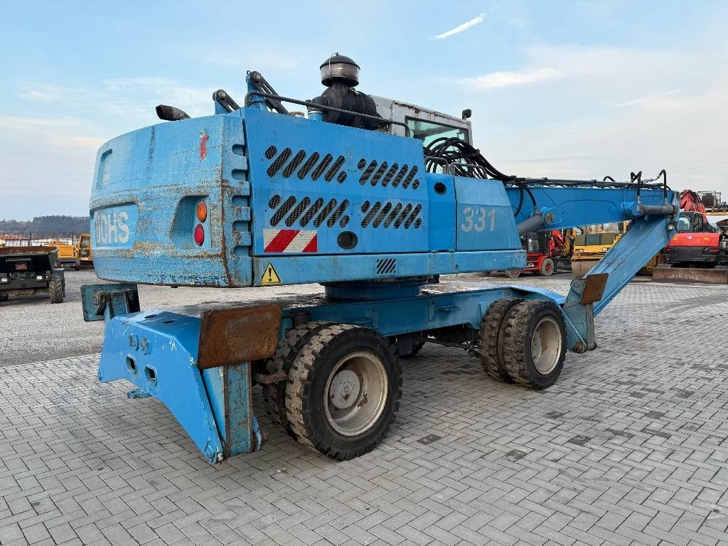 Fuchs MHL 331 - حفارة النقل والشحن: صور 5 Fuchs MHL 331 - حفارة النقل والشحن: صور 5