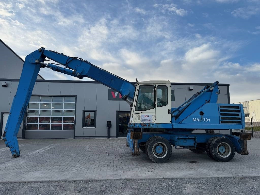 Fuchs MHL 331 - حفارة النقل والشحن: صور 2 Fuchs MHL 331 - حفارة النقل والشحن: صور 2