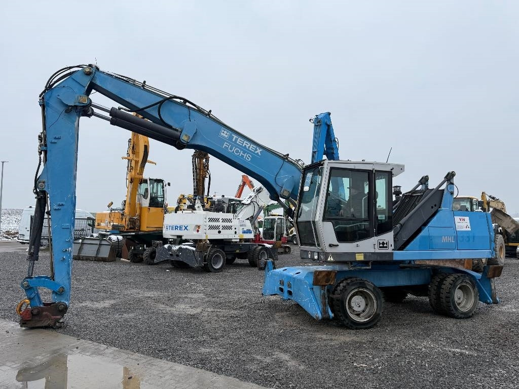 Fuchs MHL 331 - حفارة النقل والشحن: صور 1 Fuchs MHL 331 - حفارة النقل والشحن: صور 1