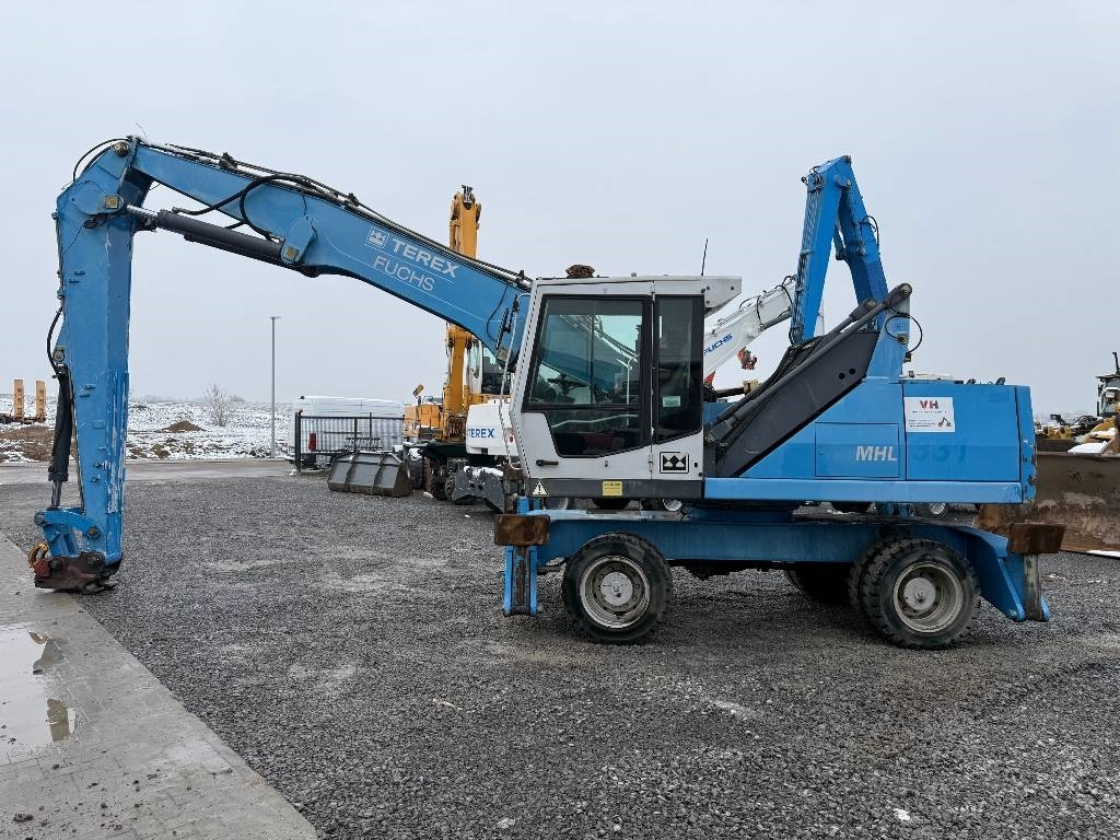 Fuchs MHL 331 - حفارة النقل والشحن: صور 2 Fuchs MHL 331 - حفارة النقل والشحن: صور 2
