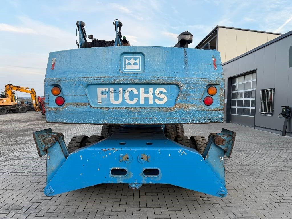 Fuchs MHL 331 - حفارة النقل والشحن: صور 4 Fuchs MHL 331 - حفارة النقل والشحن: صور 4