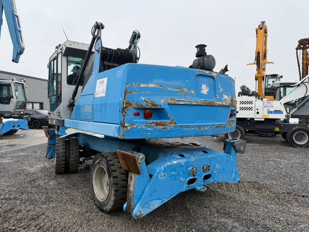 Fuchs MHL 331 - حفارة النقل والشحن: صور 3 Fuchs MHL 331 - حفارة النقل والشحن: صور 3