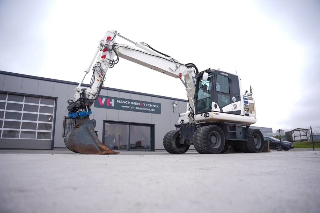Komatsu PW 148-11 - حفارة على عجلات: صور 2 Komatsu PW 148-11 - حفارة على عجلات: صور 2