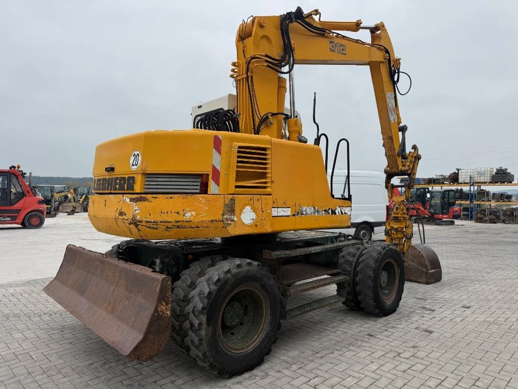 Liebherr A 312 - حفارة على عجلات: صور 5 Liebherr A 312 - حفارة على عجلات: صور 5