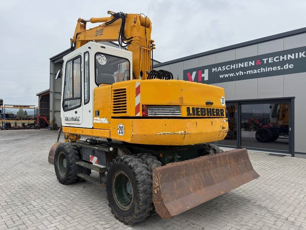 Liebherr A 312 - حفارة على عجلات: صور 3 Liebherr A 312 - حفارة على عجلات: صور 3