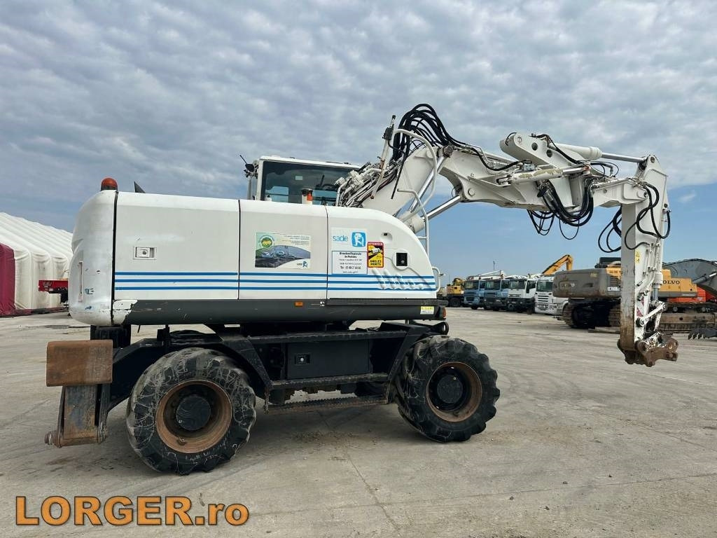 Hitachi ZX 140 W-3 - حفارة على عجلات: صور 2 Hitachi ZX 140 W-3 - حفارة على عجلات: صور 2