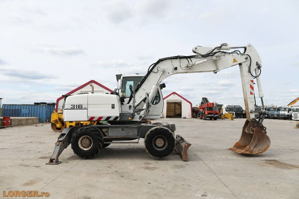 Liebherr A 316 Litronic - حفارة على عجلات: صور 1 Liebherr A 316 Litronic - حفارة على عجلات: صور 1