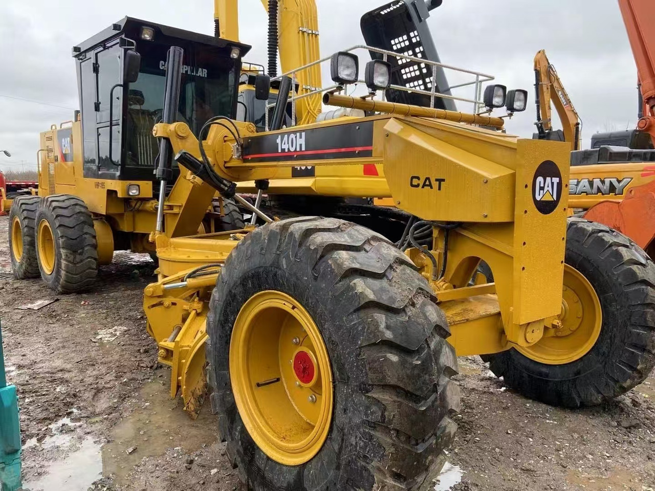 Caterpillar 140H - آلة تسوية الأرض: صور 1 Caterpillar 140H - آلة تسوية الأرض: صور 1