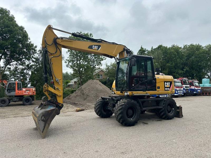 Cat M 313 D - حفارة على عجلات: صور 2 Cat M 313 D - حفارة على عجلات: صور 2