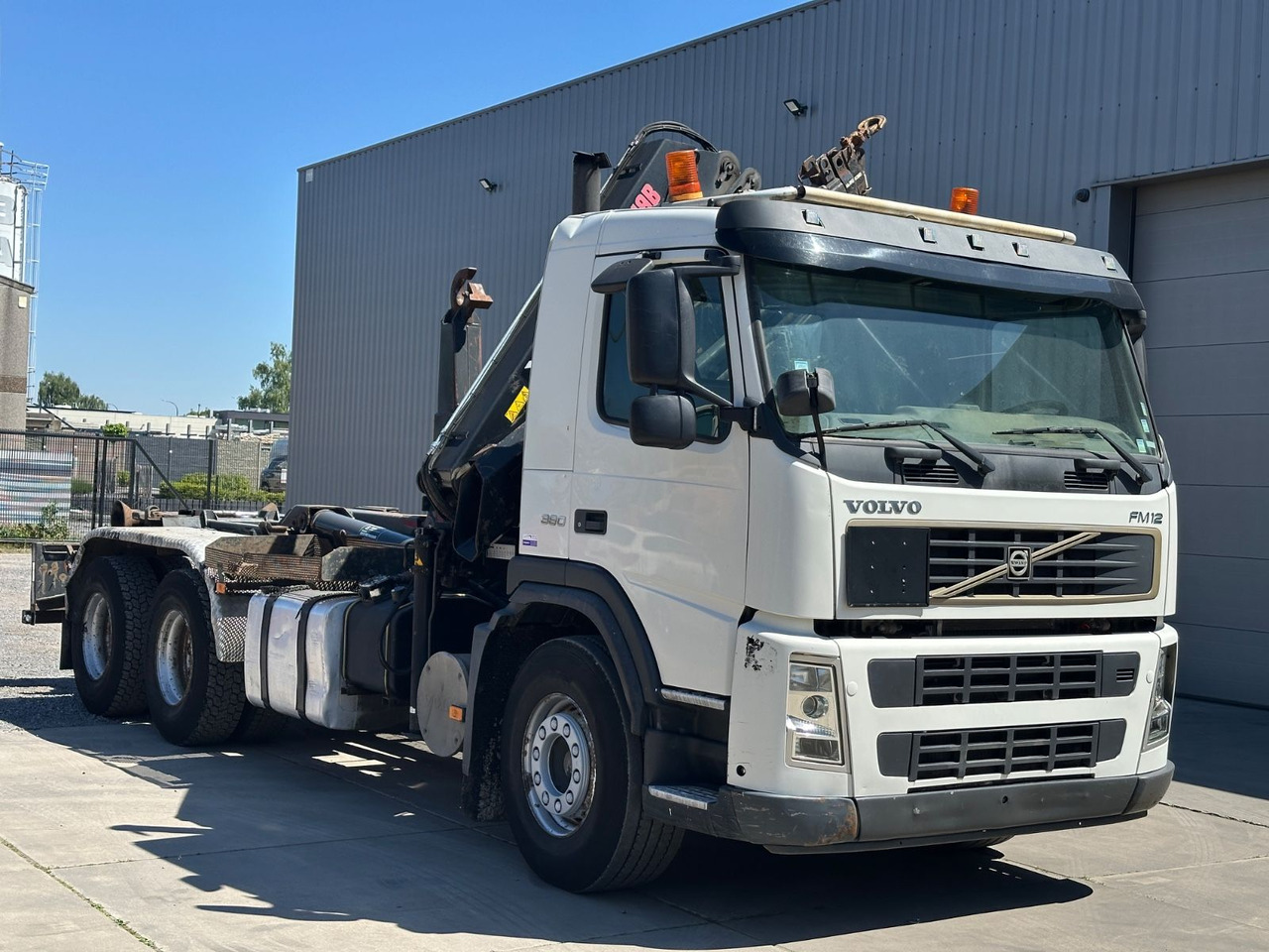 Volvo FM12 380 Hiab 144E-3 - شاحنة ذات الخطاف: صور 3 Volvo FM12 380 Hiab 144E-3 - شاحنة ذات الخطاف: صور 3