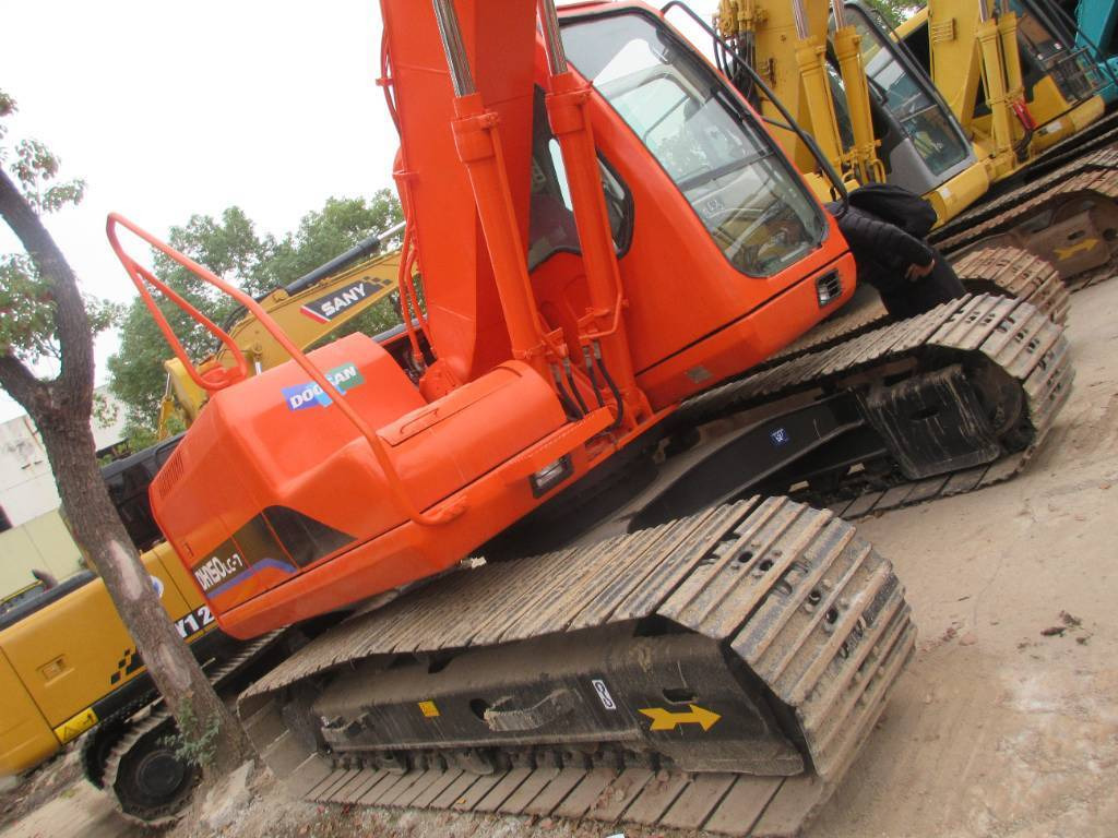 Doosan DH 150 LC-7 - حفارة على عجلات: صور 4 Doosan DH 150 LC-7 - حفارة على عجلات: صور 4