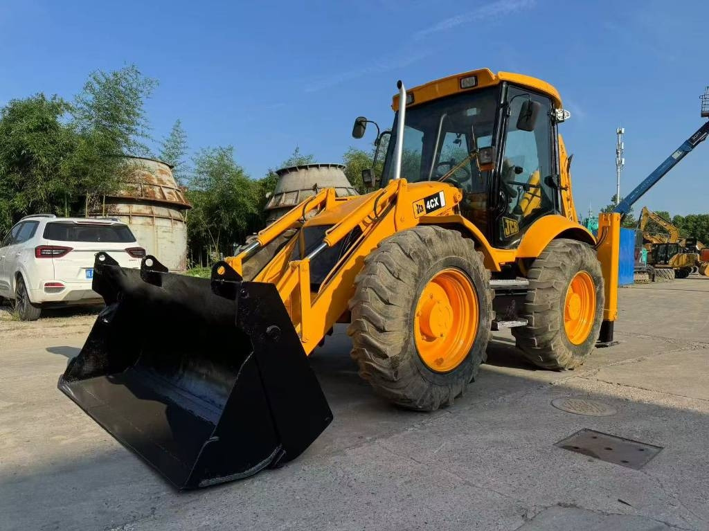JCB 4 CX - حفار متعدد الاستخدام: صور 1 JCB 4 CX - حفار متعدد الاستخدام: صور 1