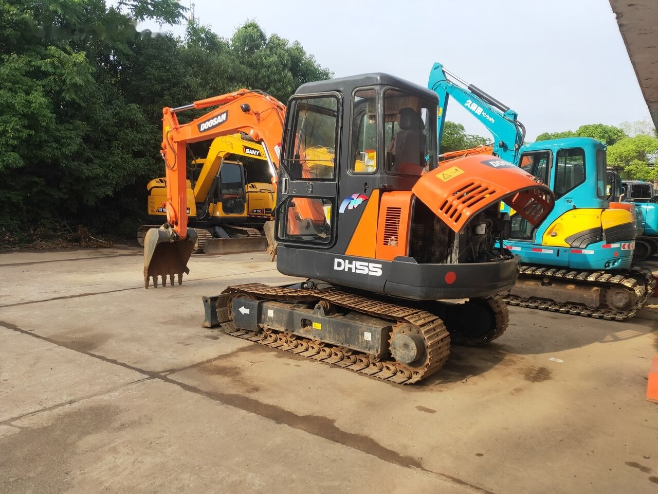 Doosan DH55 - حفارة مصغرة: صور 2 Doosan DH55 - حفارة مصغرة: صور 2