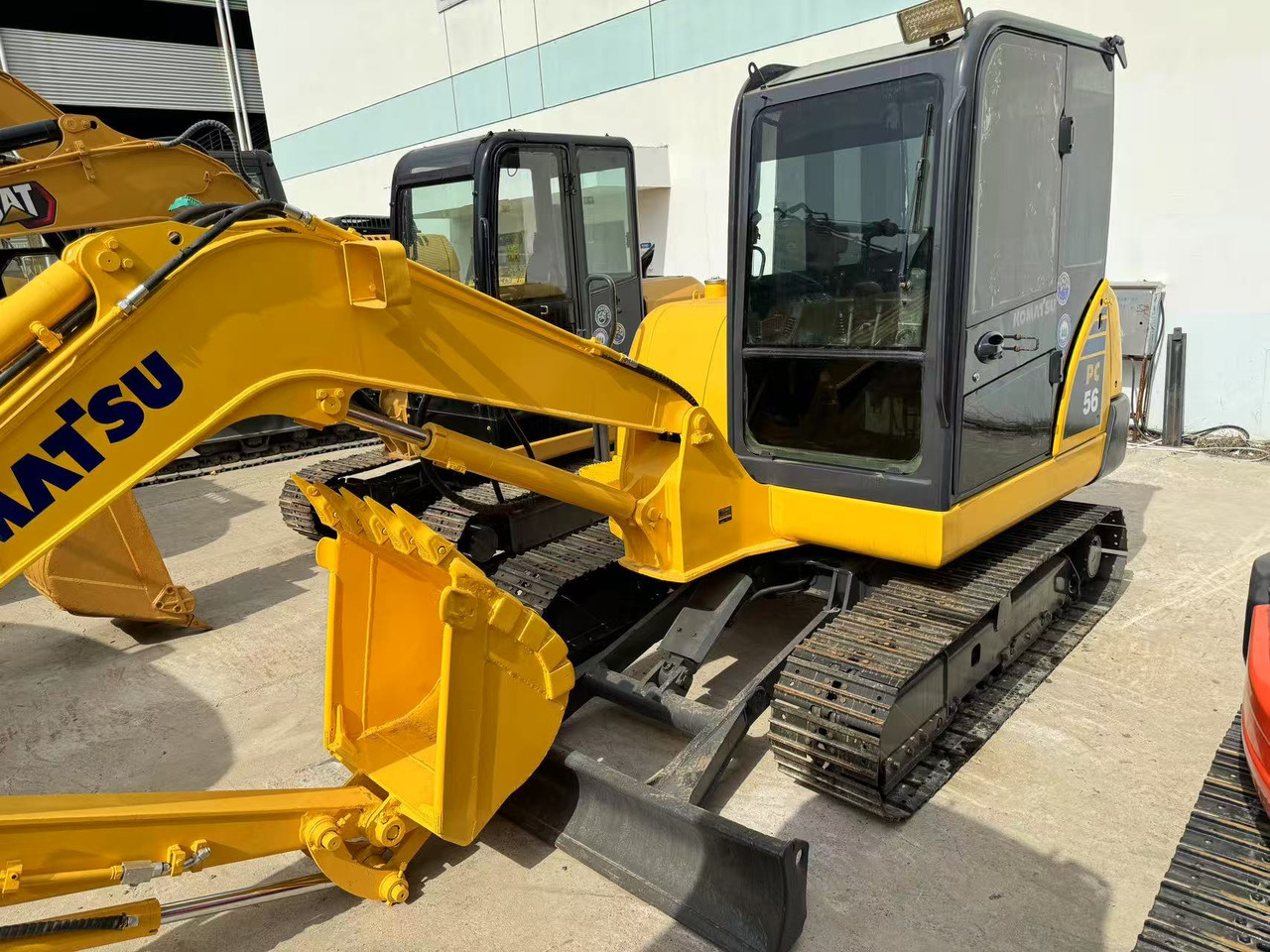 KOMATSU PC56-7 - حفارة مصغرة: صور 2 KOMATSU PC56-7 - حفارة مصغرة: صور 2