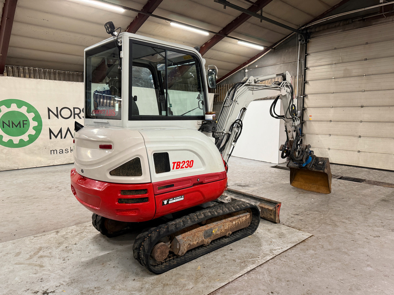 Takeuchi TB230 - حفارة مصغرة: صور 5 Takeuchi TB230 - حفارة مصغرة: صور 5