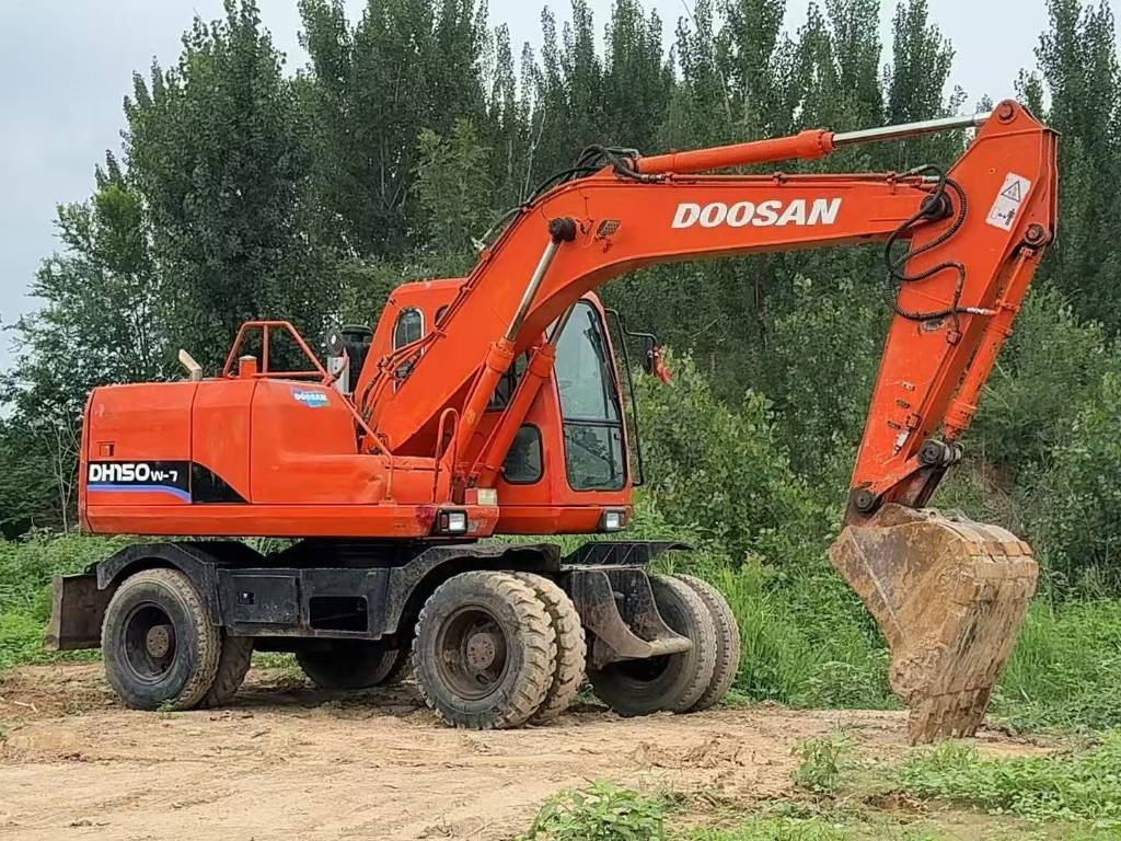 Doosan DH 150 W-7 - حفارة على عجلات: صور 1 Doosan DH 150 W-7 - حفارة على عجلات: صور 1