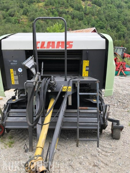 الآلات والماكينات الزراعية 2010 Claas 455 uniwrap 455: صور 1
