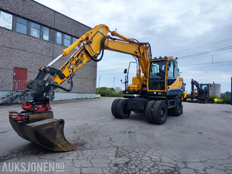 2016 Hyundai R140W-9 hjulgraver med leddet bom, tiltrotator og pusseskuff - حفارة: صور 2 2016 Hyundai R140W-9 hjulgraver med leddet bom, tiltrotator og pusseskuff - حفارة: صور 2