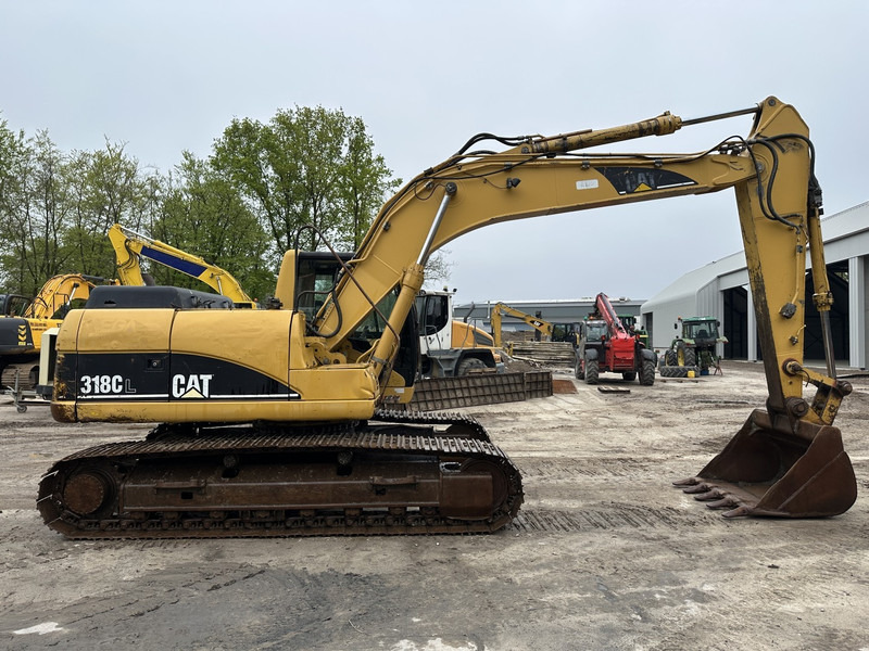 Caterpillar 318 CL (not 320CL - 325CL) - حفارات زحافة: صور 4 Caterpillar 318 CL (not 320CL - 325CL) - حفارات زحافة: صور 4