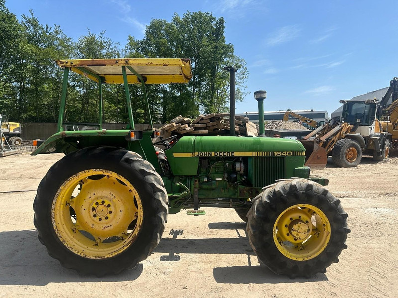 John Deere 1640 4x4 - جرار مع تطهير الأرض عالية: صور 4 John Deere 1640 4x4 - جرار مع تطهير الأرض عالية: صور 4