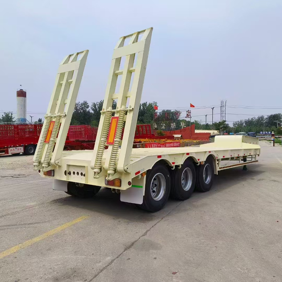ZHICHENG Semi Flat Bed Low Bed Lowboy bed truck in New or Used Condition and various Size for Sale - عربة مسطحة منخفضة نصف مقطورة: صور 4 ZHICHENG Semi Flat Bed Low Bed Lowboy bed truck in New or Used Condition and various Size for Sale - عربة مسطحة منخفضة نصف مقطورة: صور 4