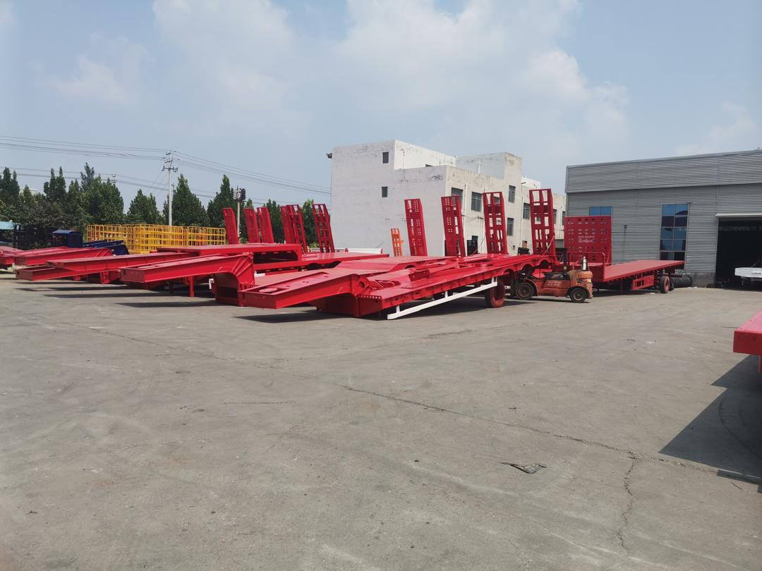 ZHICHENG Semi Flat Bed Low Bed in length 8M, 10M, 12M, 14M,16M - عربة مسطحة منخفضة نصف مقطورة: صور 3 ZHICHENG Semi Flat Bed Low Bed in length 8M, 10M, 12M, 14M,16M - عربة مسطحة منخفضة نصف مقطورة: صور 3