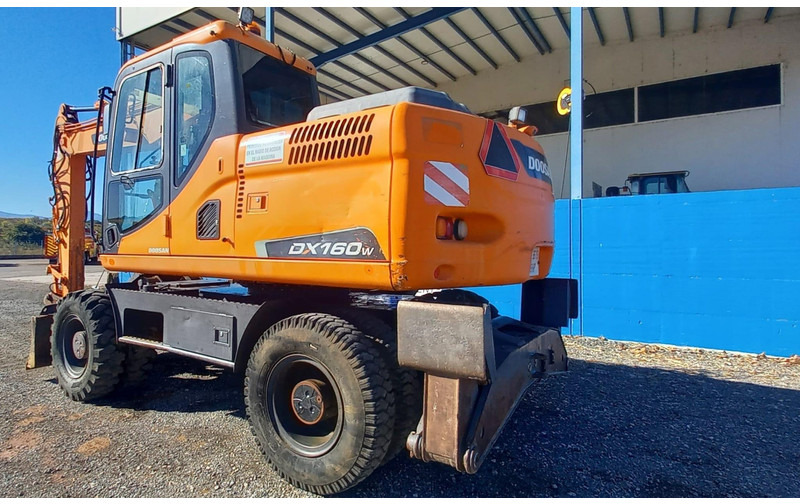 Doosan DX140W-3 - حفارة على عجلات: صور 3 Doosan DX140W-3 - حفارة على عجلات: صور 3