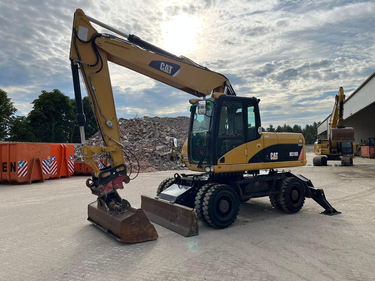 Caterpillar M318D - حفارة على عجلات: صور 5 Caterpillar M318D - حفارة على عجلات: صور 5