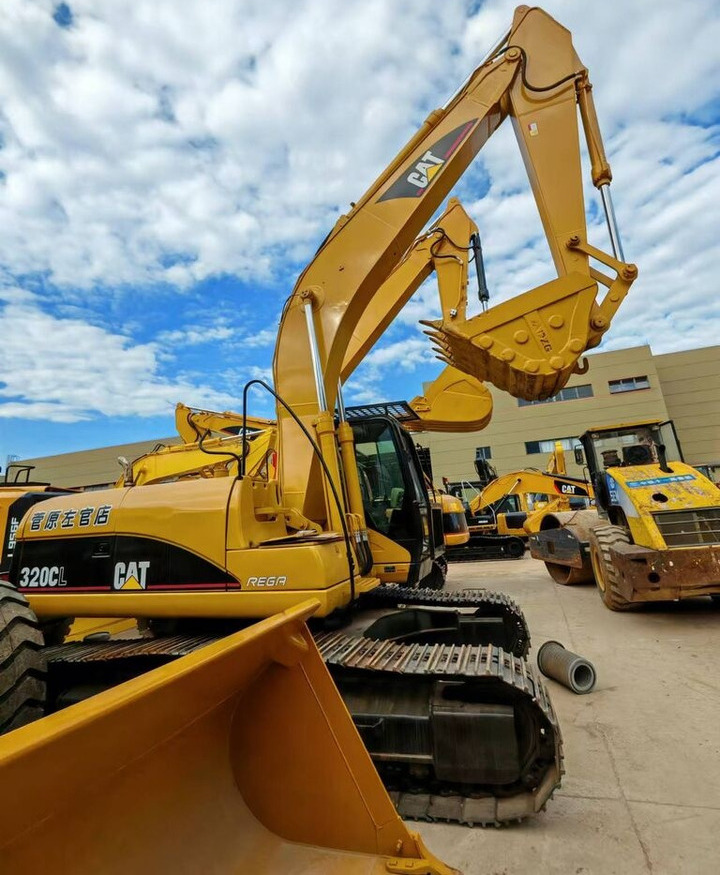 Caterpillar 320CL - حفارة على عجلات: صور 2 Caterpillar 320CL - حفارة على عجلات: صور 2