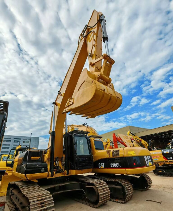Caterpillar 320CL - حفارة على عجلات: صور 1 Caterpillar 320CL - حفارة على عجلات: صور 1