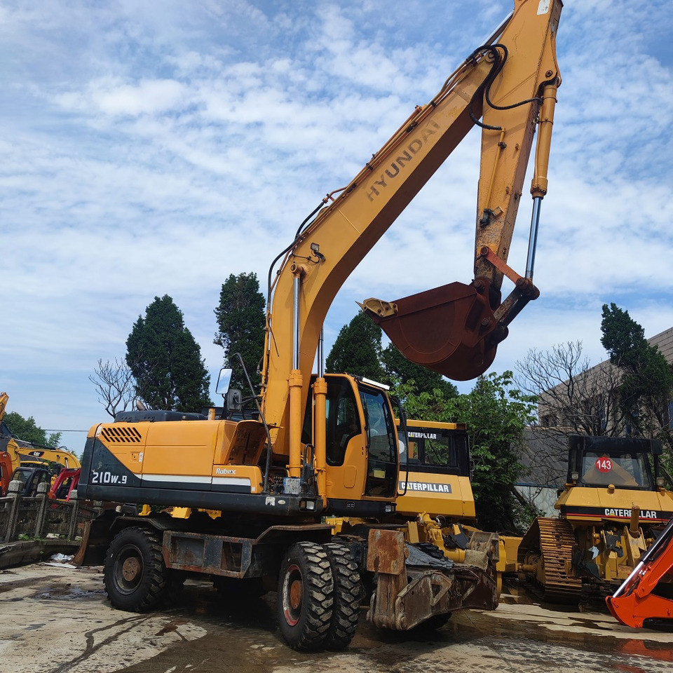 Hyundai 210w-9 wheel excavator - حفارة على عجلات: صور 1 Hyundai 210w-9 wheel excavator - حفارة على عجلات: صور 1