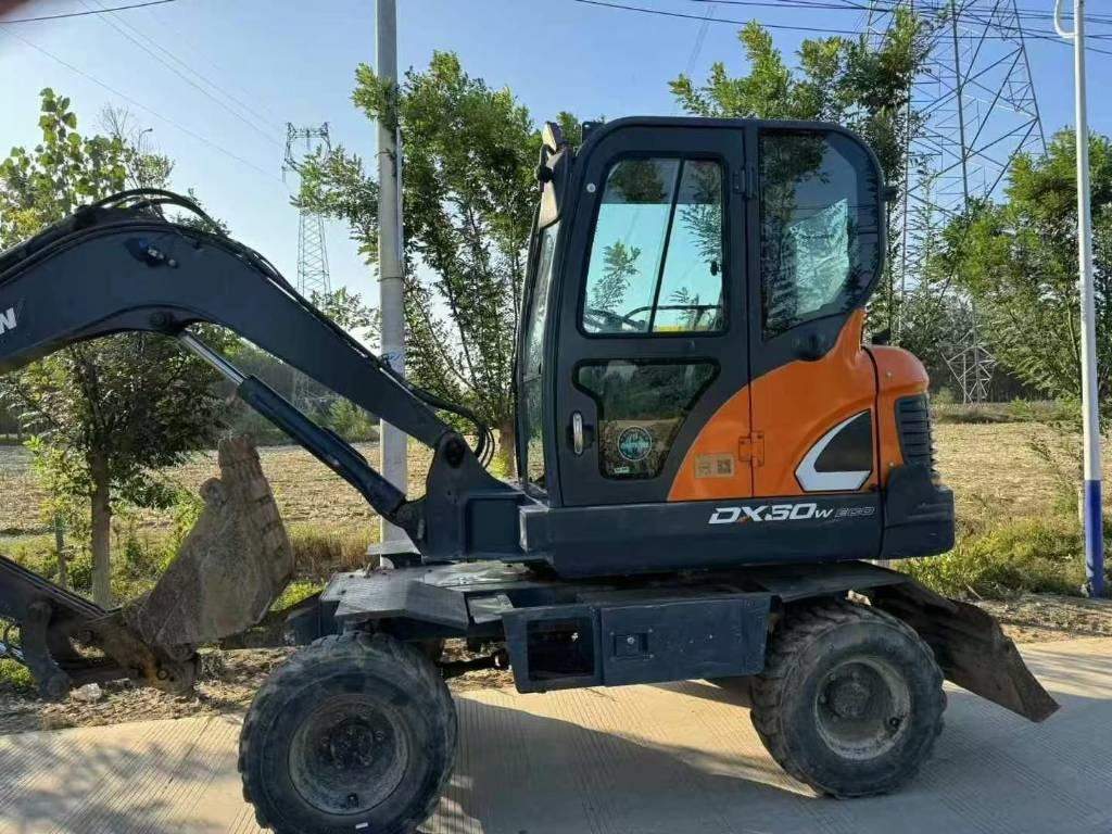 Doosan DX 60  - حفارة مصغرة: صور 4 Doosan DX 60  - حفارة مصغرة: صور 4