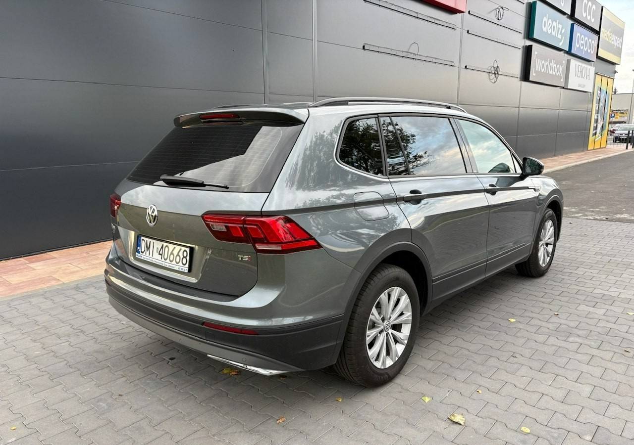 Volkswagen Tiguan II 1,4TSI 150KM 65tyśkm 7osobowy Comfort Tempomat ACC Klima Alu 2018 - سيارة دفع رباعي: صور 4 Volkswagen Tiguan II 1,4TSI 150KM 65tyśkm 7osobowy Comfort Tempomat ACC Klima Alu 2018 - سيارة دفع رباعي: صور 4