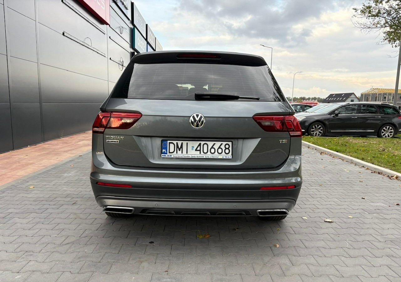 Volkswagen Tiguan II 1,4TSI 150KM 65tyśkm 7osobowy Comfort Tempomat ACC Klima Alu 2018 - سيارة دفع رباعي: صور 5 Volkswagen Tiguan II 1,4TSI 150KM 65tyśkm 7osobowy Comfort Tempomat ACC Klima Alu 2018 - سيارة دفع رباعي: صور 5