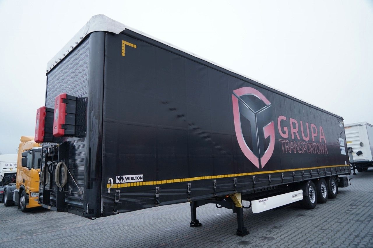 Wielton FIRANKA / VARIOS / 2x OŚ PODNOSZONA / - الخيمة نصف مقطورة: صور 2 Wielton FIRANKA / VARIOS / 2x OŚ PODNOSZONA / - الخيمة نصف مقطورة: صور 2