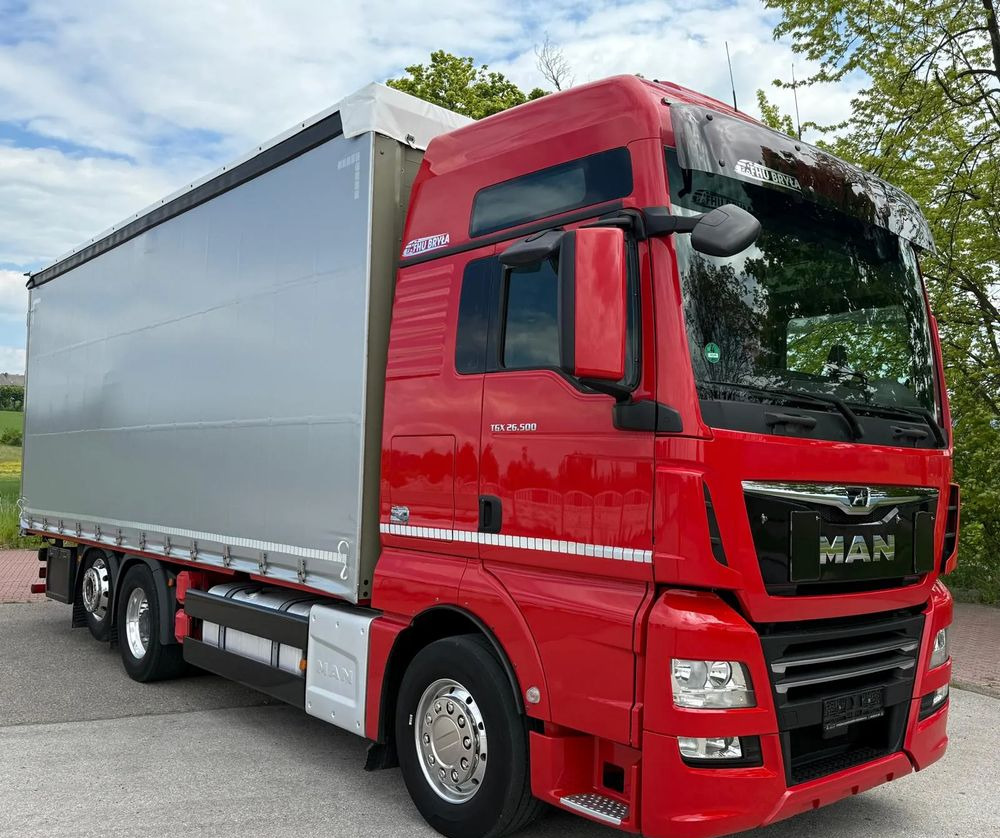 MAN TGX 26.500/LIFT/6X2/KLIMA POSTOJOWA/18PALET/E6/FIRANKA/WINDA/NISKI PRZEBIEG/JEDEN WŁAŚCICIEL/PODWIESZANA OŚ - شاحنة ستارة: صور 1 MAN TGX 26.500/LIFT/6X2/KLIMA POSTOJOWA/18PALET/E6/FIRANKA/WINDA/NISKI PRZEBIEG/JEDEN WŁAŚCICIEL/PODWIESZANA OŚ - شاحنة ستارة: صور 1