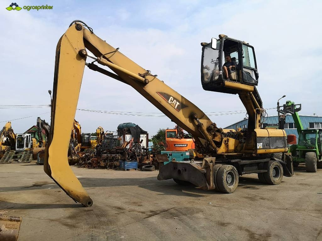 CAT M 322 C MH - حفارة النقل والشحن: صور 1 CAT M 322 C MH - حفارة النقل والشحن: صور 1