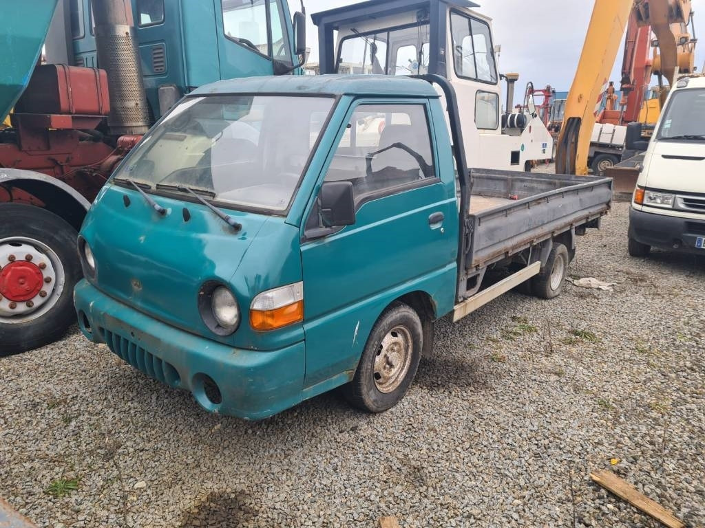 Hyundai H 100 - شاحنات مسطحة: صور 1 Hyundai H 100 - شاحنات مسطحة: صور 1