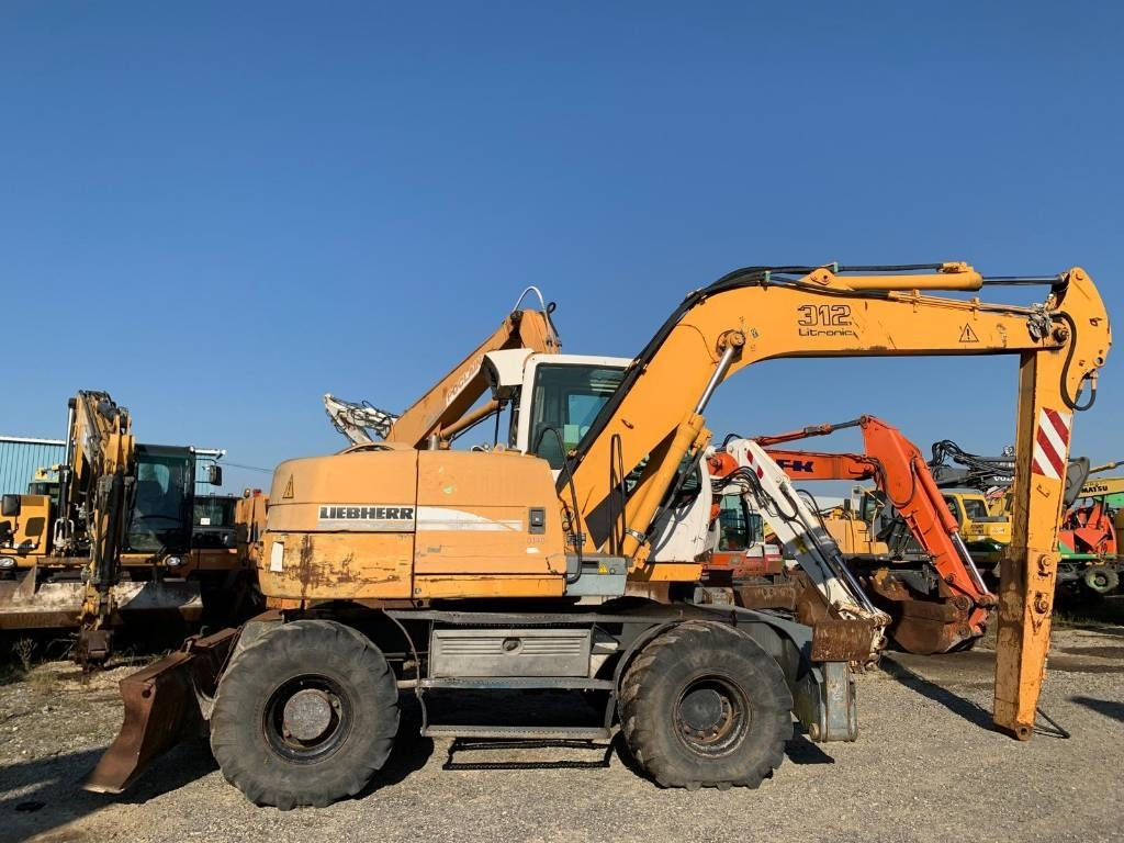 حفارة على عجلات Liebherr A 312: صور 6