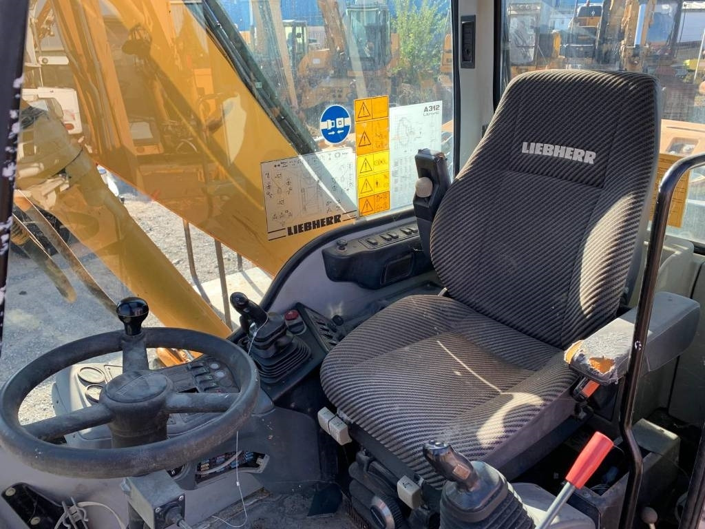 حفارة على عجلات Liebherr A 312: صور 9