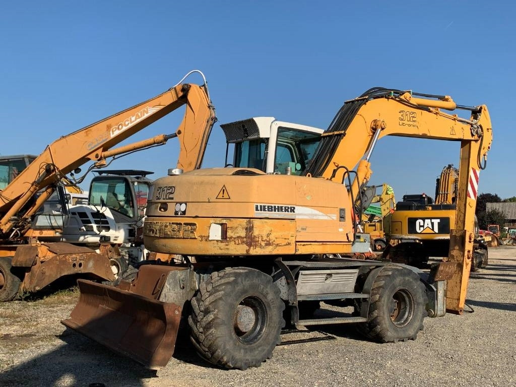 حفارة على عجلات Liebherr A 312: صور 7