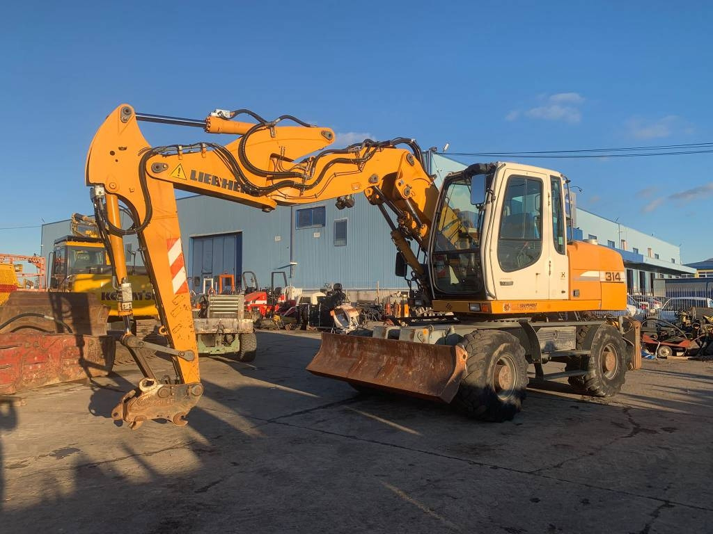 Liebherr A 314 Litronic - حفارة على عجلات: صور 1 Liebherr A 314 Litronic - حفارة على عجلات: صور 1
