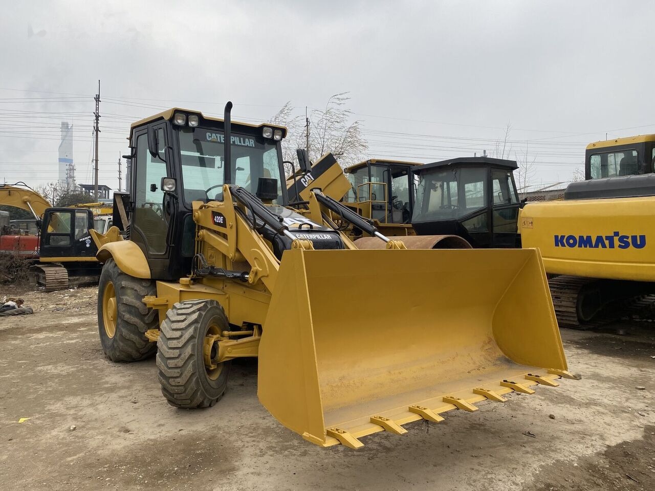 Caterpillar 420E - حفار متعدد الاستخدام: صور 1 Caterpillar 420E - حفار متعدد الاستخدام: صور 1