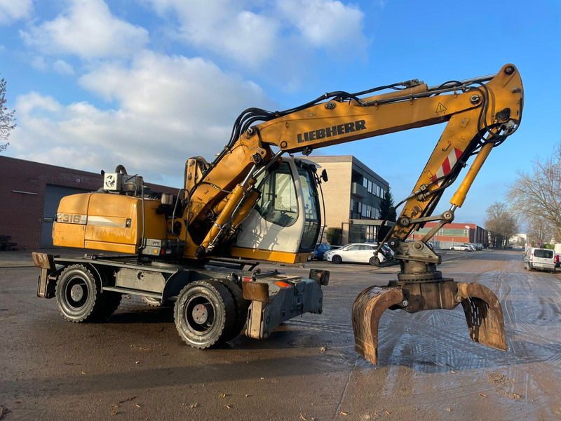 Liebherr A 316 - حفارة على عجلات: صور 1 Liebherr A 316 - حفارة على عجلات: صور 1