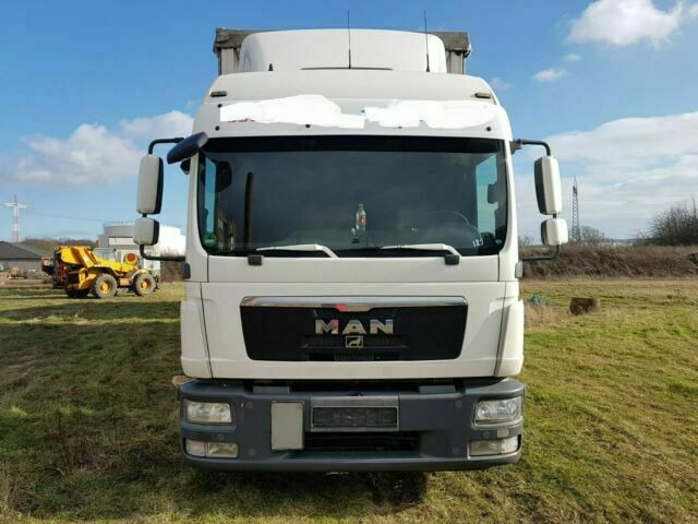 MAN TGL8.240 G.Haus/2xBett Klima AHK - شاحنة ستارة: صور 1 MAN TGL8.240 G.Haus/2xBett Klima AHK - شاحنة ستارة: صور 1