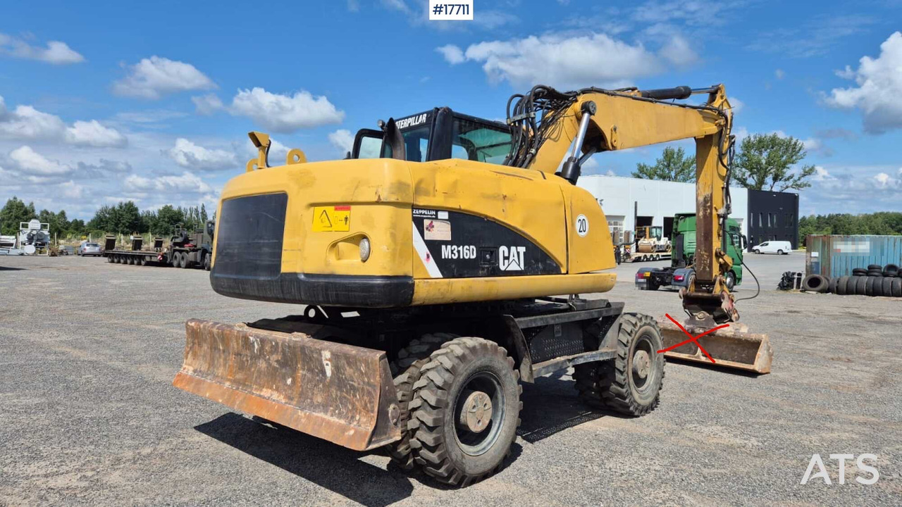 حفارة على عجلات 2008 CAT M316D: صور 11