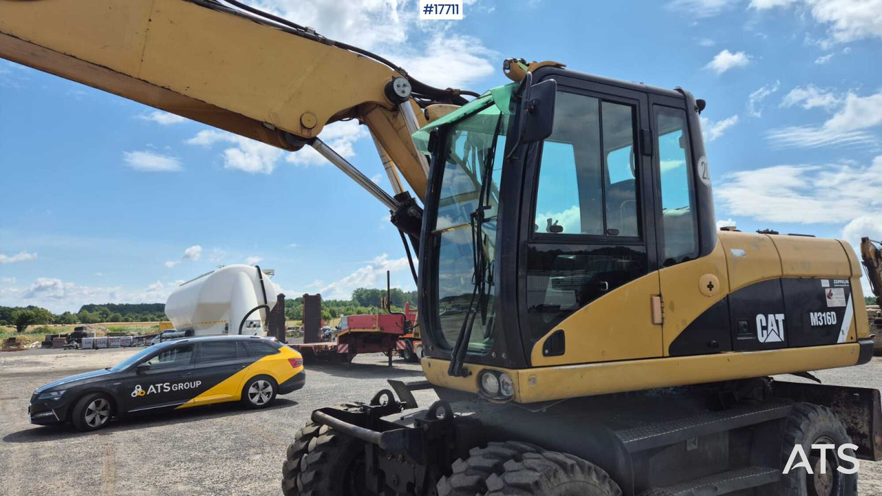 حفارة على عجلات 2008 CAT M316D: صور 16