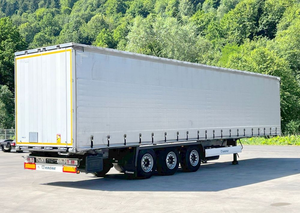 Krone Firanka Coilmulde // 9m // Alu Drzwi // Ażury // Oś podnoszona // - الخيمة نصف مقطورة: صور 1 Krone Firanka Coilmulde // 9m // Alu Drzwi // Ażury // Oś podnoszona // - الخيمة نصف مقطورة: صور 1